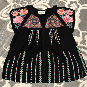 Savanna one top. Gorgeous embroidery. Very neck. Excellent condition.